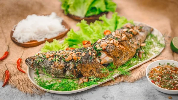 Nằm mơ ăn cá lóc nướng là điềm báo tốt lành cho người chiêm bao